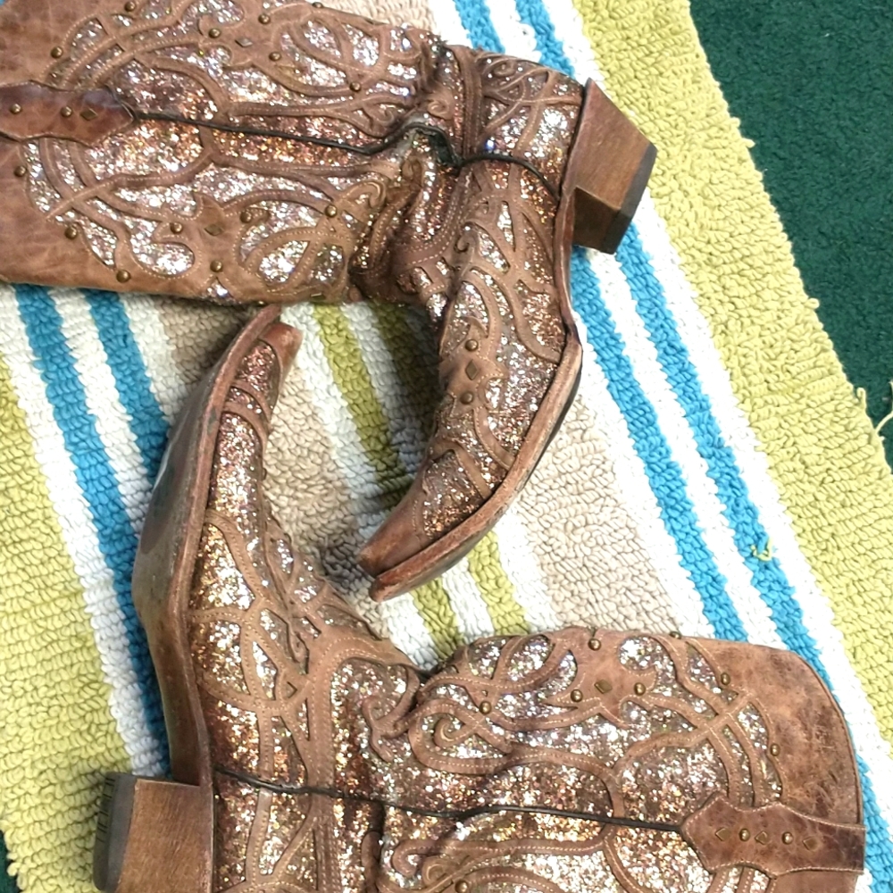 Used Corral boots has a tear.